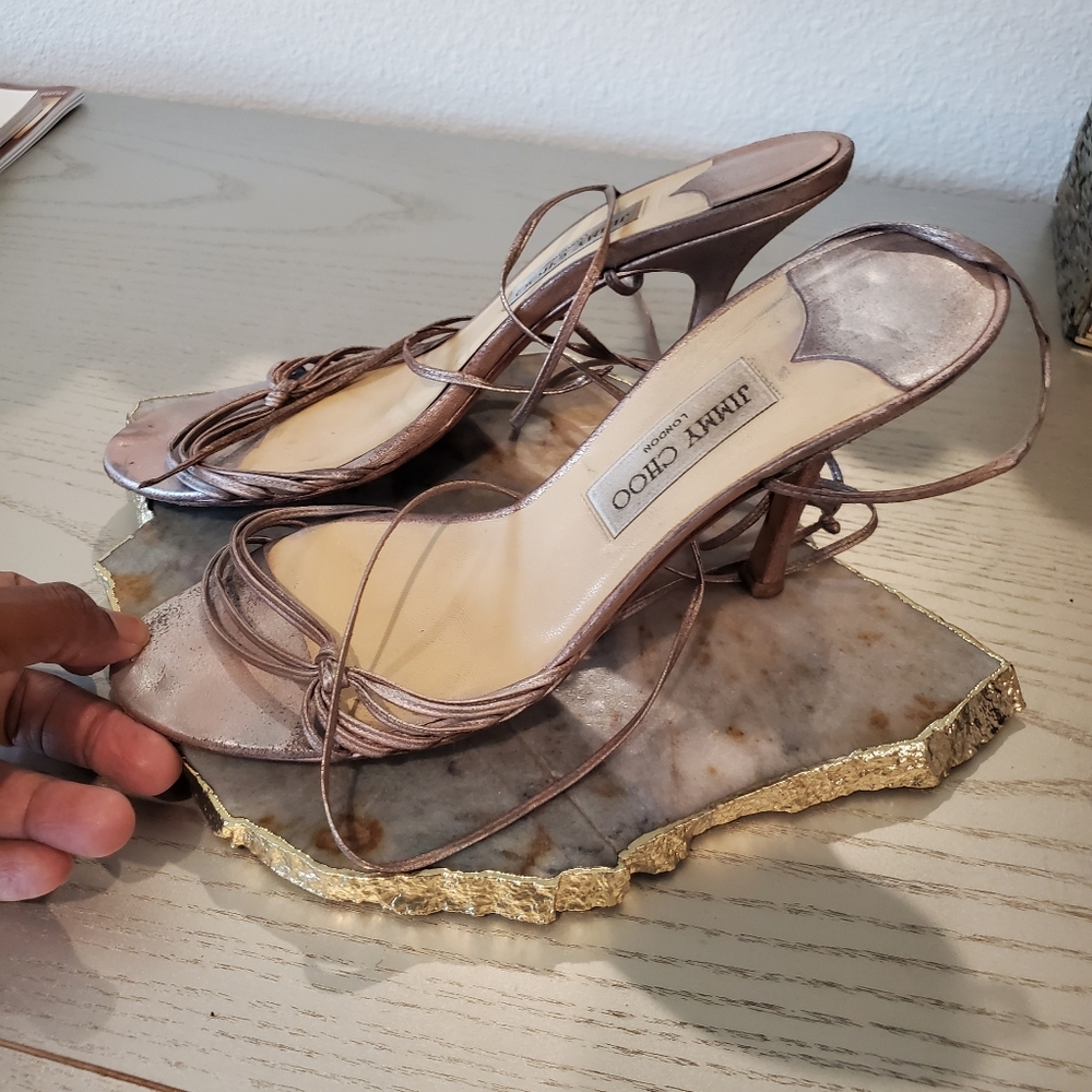 Well-worn metallic strappy Jimmy Choo